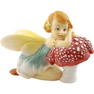Flower Fairy Resting on Mushroom Statue