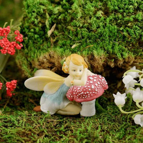 Flower Fairy Resting on Mushroom Statue
