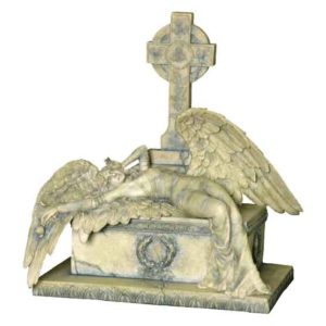 Mourning Angel Lying On A Grave Statue