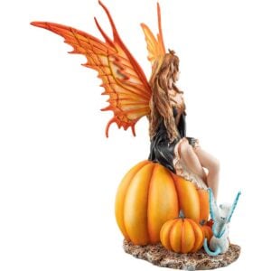 Fairy Sitting on a Pumpkin Statue