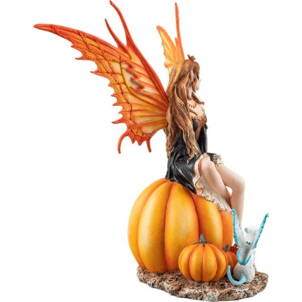 Fairy Sitting on a Pumpkin Statue