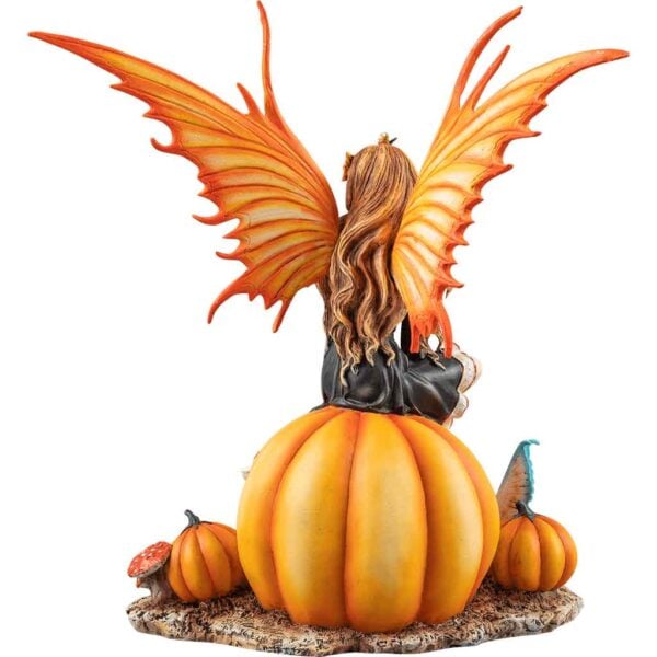 Fairy Sitting on a Pumpkin Statue