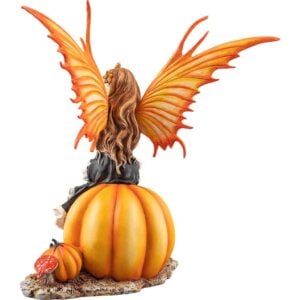 Fairy Sitting on a Pumpkin Statue