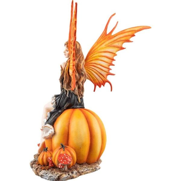 Fairy Sitting on a Pumpkin Statue