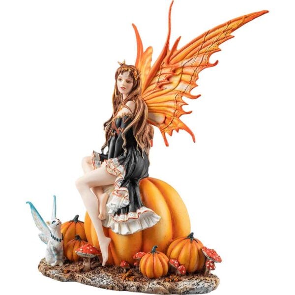 Fairy Sitting on a Pumpkin Statue
