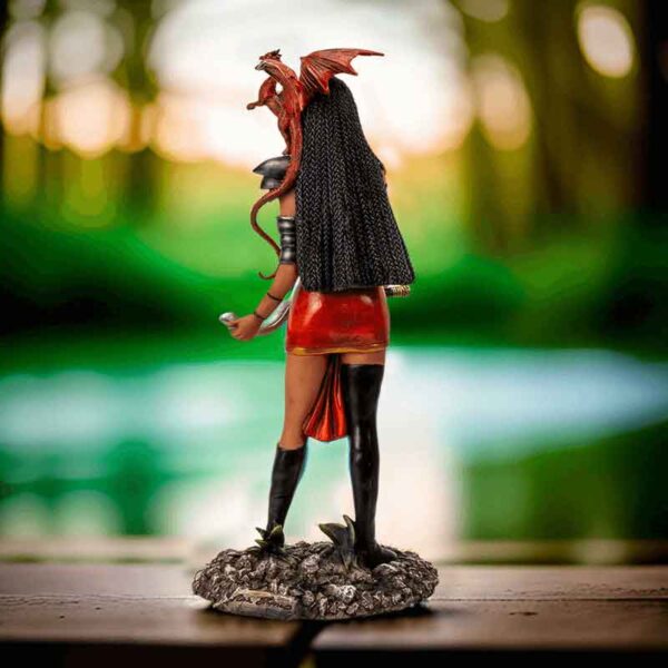 Adaeze and Red Dragon Statue