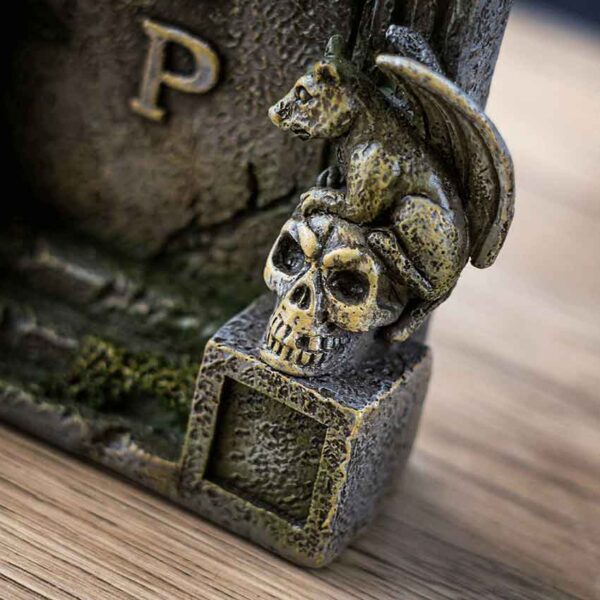 Overgrown Tombstone Statue
